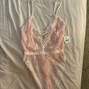 Brand New lingerie body suit size small